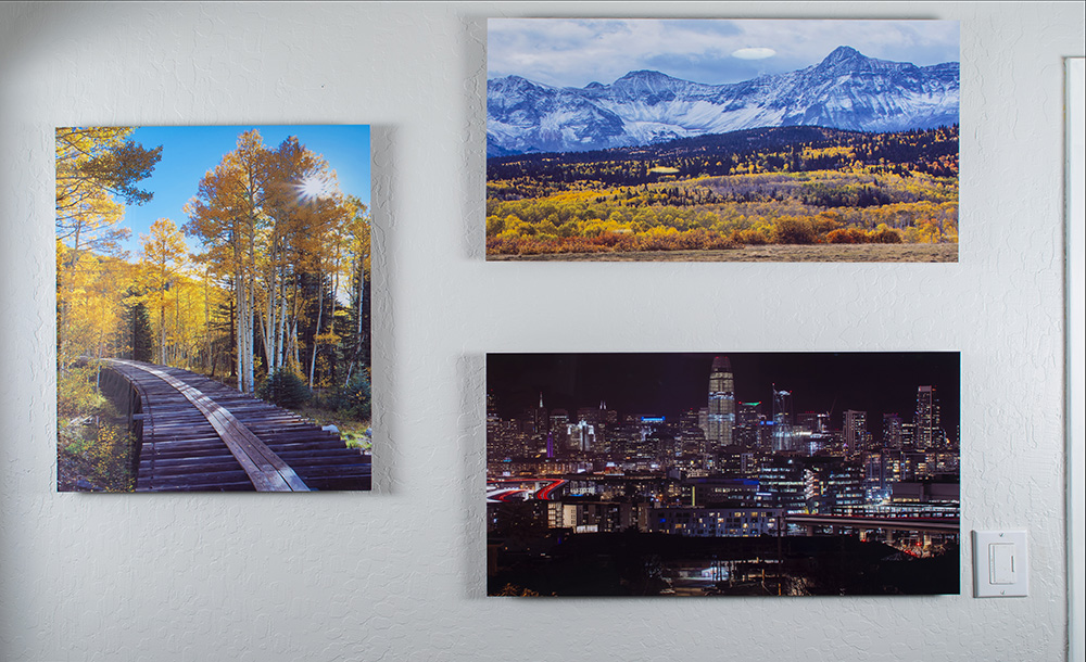 A wall display of John A. Vink images.